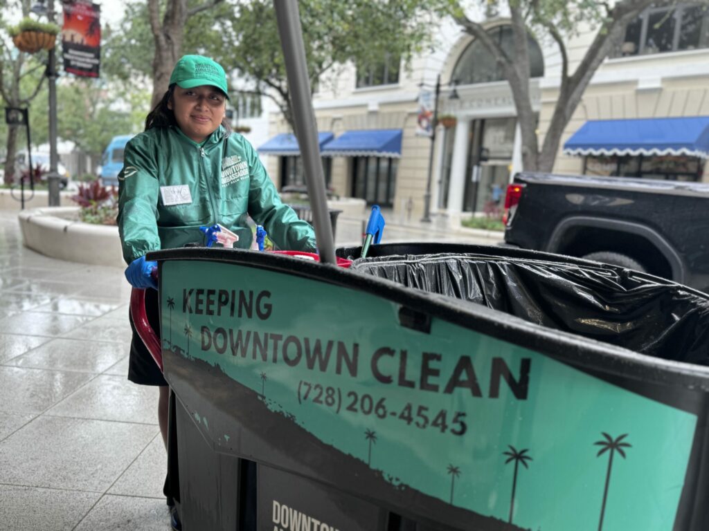 A West Palm Beach Ambassador pushing a Mega Brute with district branding on it.